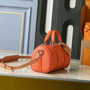 Two Tone Grainy Leather Cylinder Pillow Bag